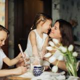 photo of woman playing with her children 3806953